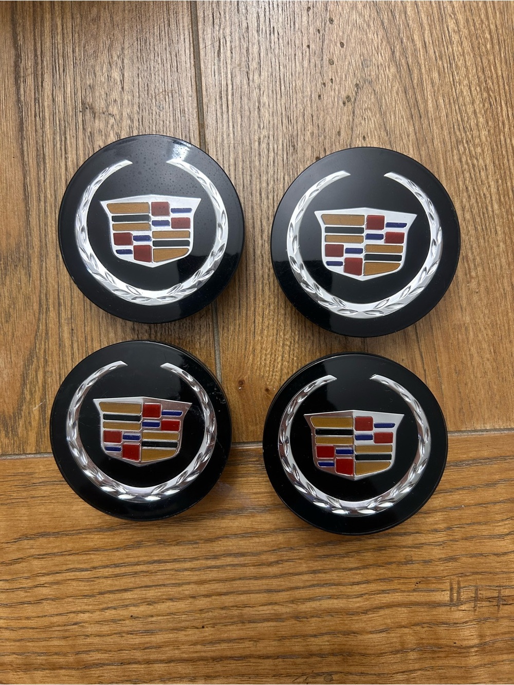 Cadillac Gloss Black Wheel Center Caps with Crest - Set of 4